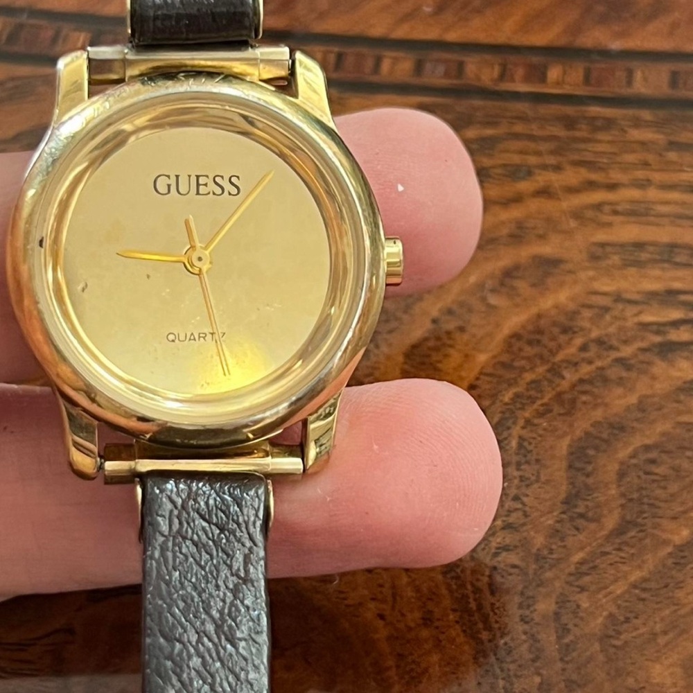 Guess Women's Gold Watch with Black Strap